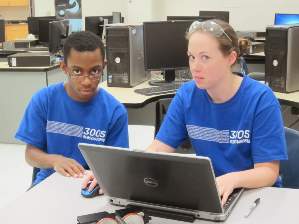 Student Quentin N. and mentor Rachel Moore do not like having their CAD time disturbed